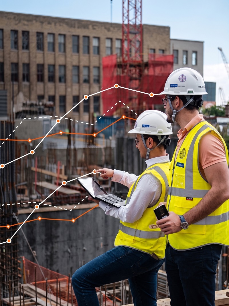 Intirbim engineers reviewing live performance analytics on site